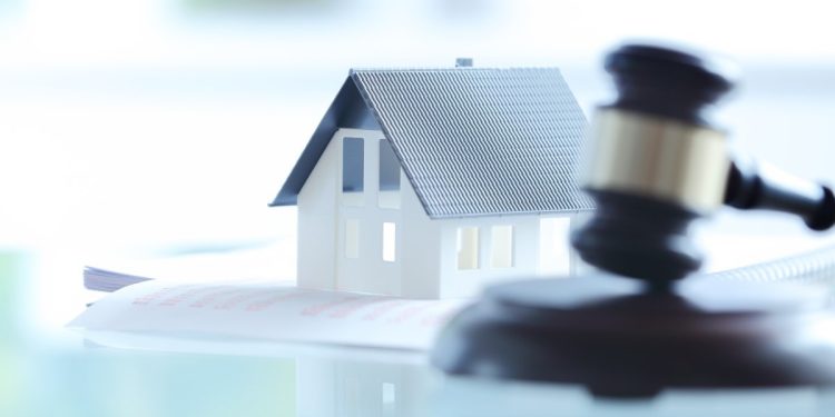 Buying a Property at Auction in the UK: Risks and Rewards